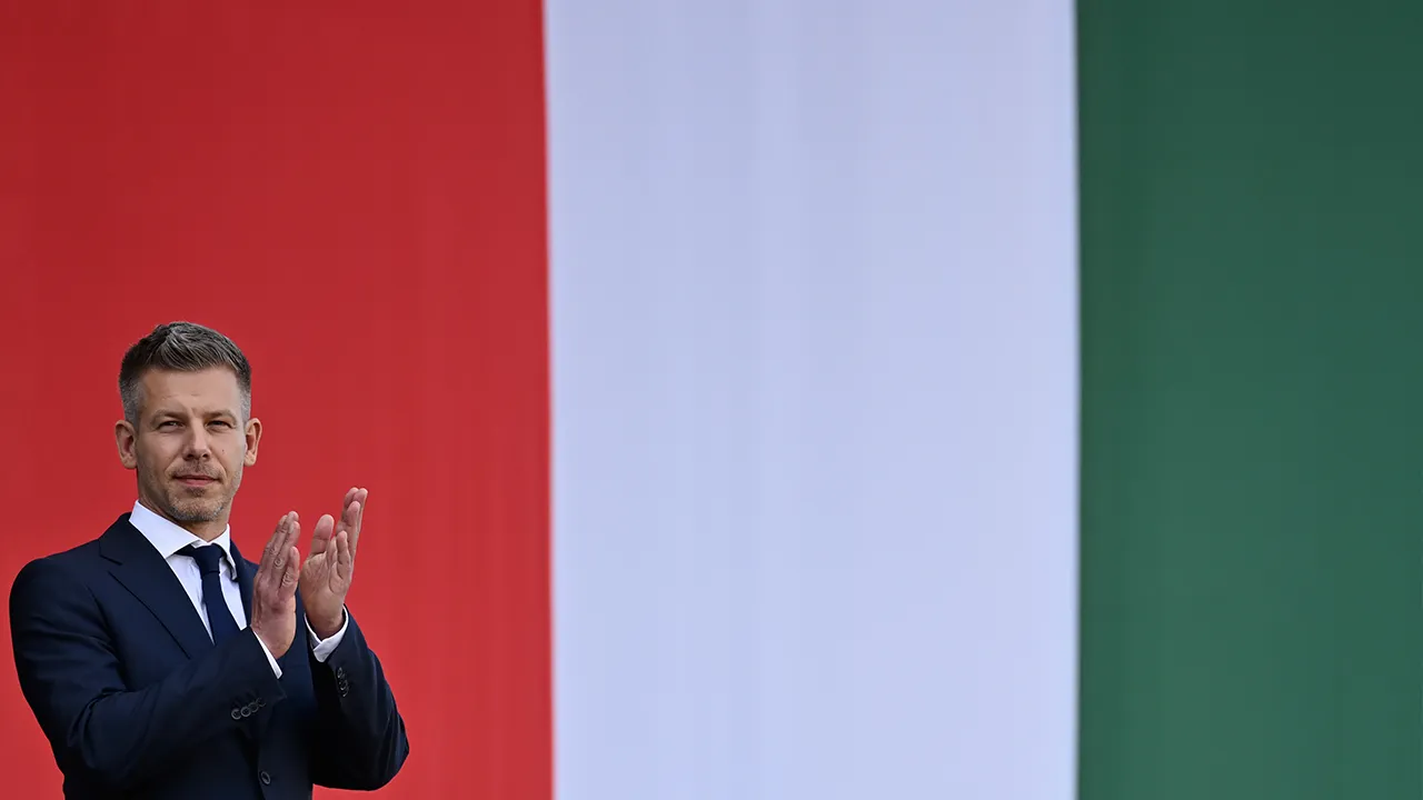 Hungarian Prime Minister Peter Magyar applauds in front of the Hungarian Parliament, after taking his oath of office in Budapest, Hungary, Saturday, May 9, 2026. (AP Photo/Denes Erdos)