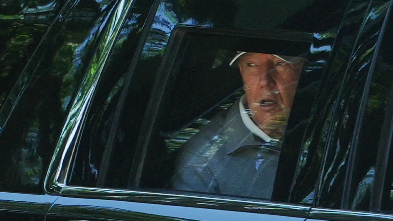 U.S. President Donald Trump looks out of the window of the limousine known as "The Beast", as he departs the White House for Trump National Golf Club in Sterling, Virginia, in Washington, D.C., U.S., May 30, 2026. REUTERS/Aaron Schwartz