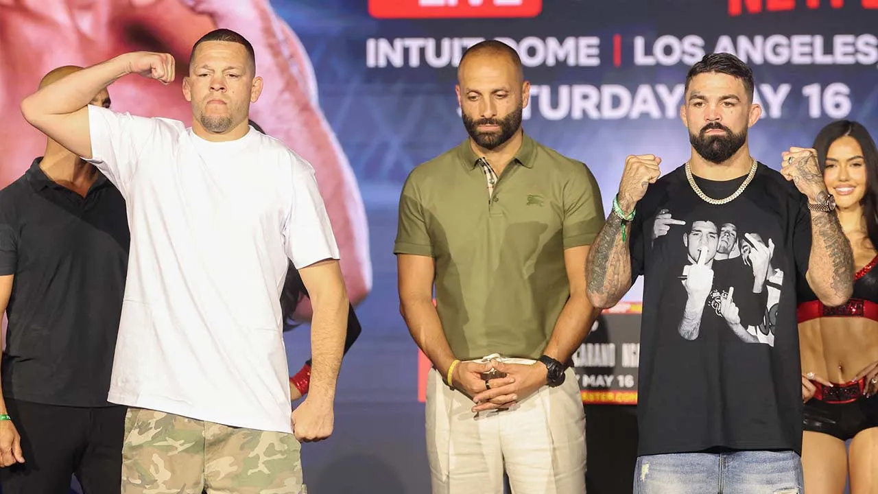 Apr 15, 2026; New York, NY, USA; Nate Diaz and Mike Perry pose after the press conference for the Most Valuable Promotions MMA card at Palladium Theater. Mandatory Credit: Ed Mulholland-Imagn Images