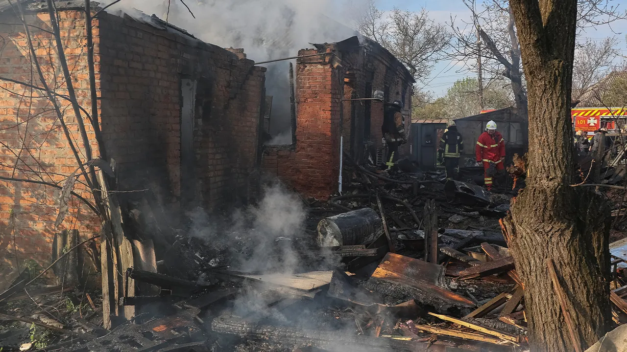 Rescuers work at the site of the private house hit by a Russian drone strike, amid Russia's attack on Ukraine, in Kharkiv, Ukraine May 6, 2026. REUTERS/Vyacheslav Madiyevskyy