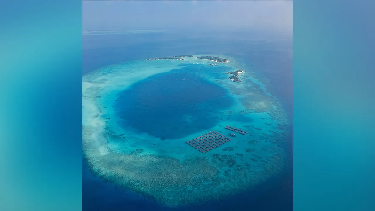 Aerial view of the 2.4 MW SolarSea floating photovoltaic installation at Cheval Blanc Randheli, Noonu Atoll, Maldives — the largest floating solar array at sea in the country. Installed by Swimsol, the system replaces an estimated USD 1.5 million per year in diesel. (Photo: Swimsol)