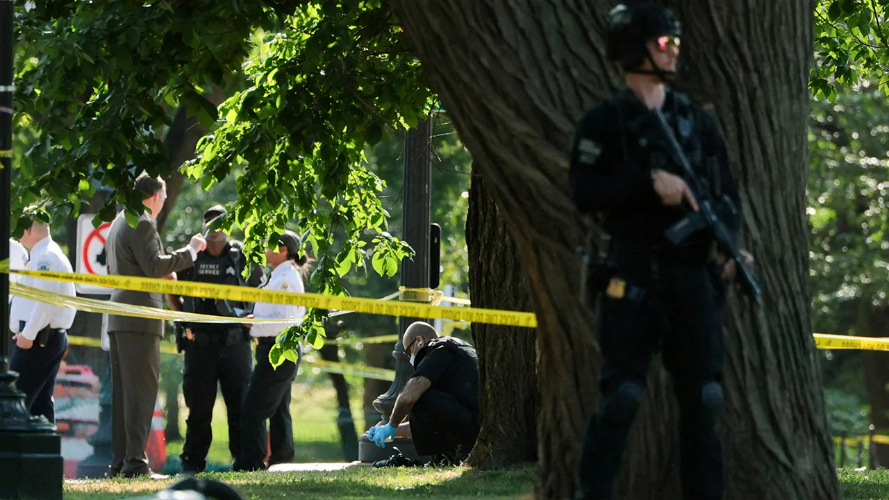 A U.S. Secret Service crime scene investigator works at the scene of an officer-involved shooting in Washington, D.C., U.S., May 4, 2026. REUTERS/Jonathan Ernst TPX IMAGES OF THE DAY