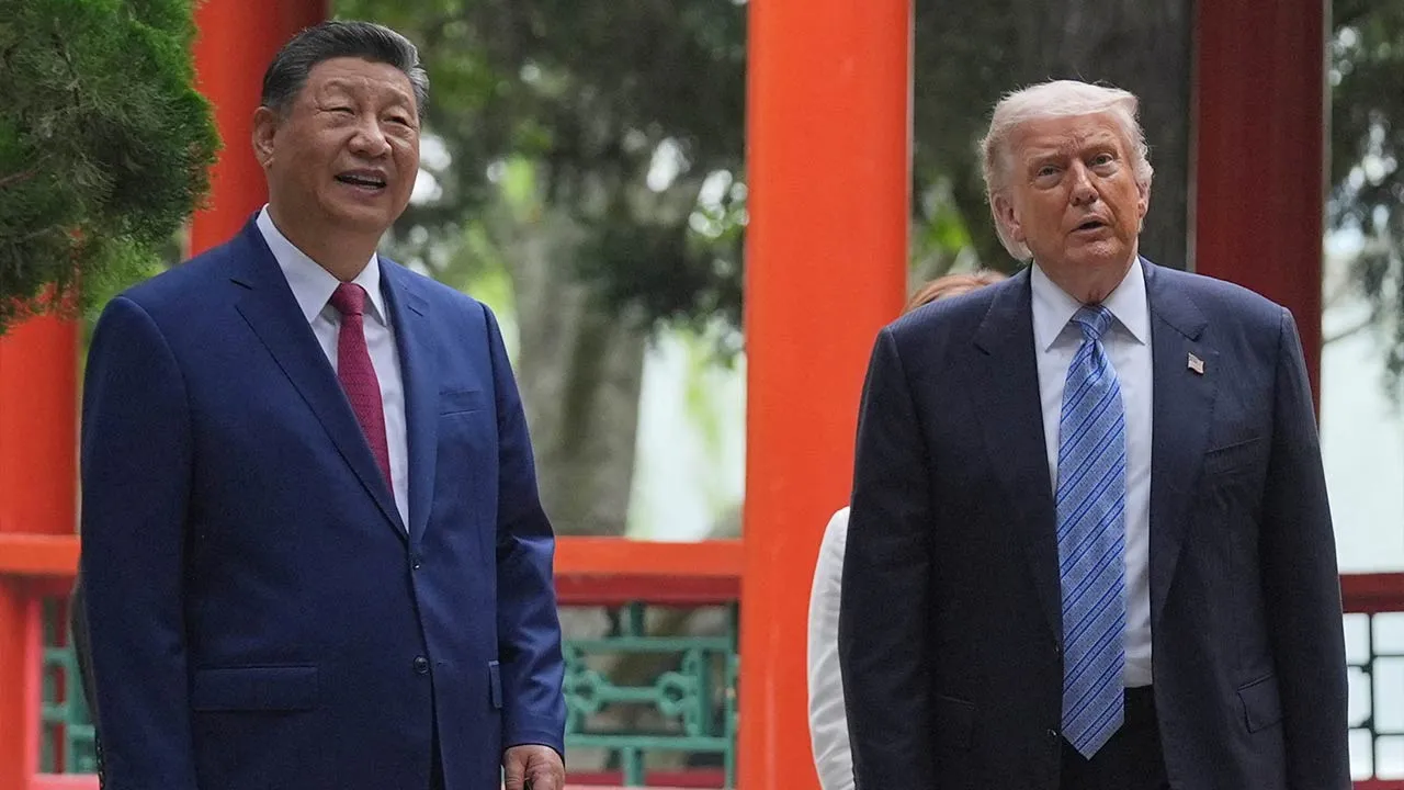 President Donald Trump talks with China’s President Xi Jinping at the Zhongnanhai leadership compound, Friday, May 15, 2026, in Beijing. Mark Schiefelbein/Pool via REUTERS