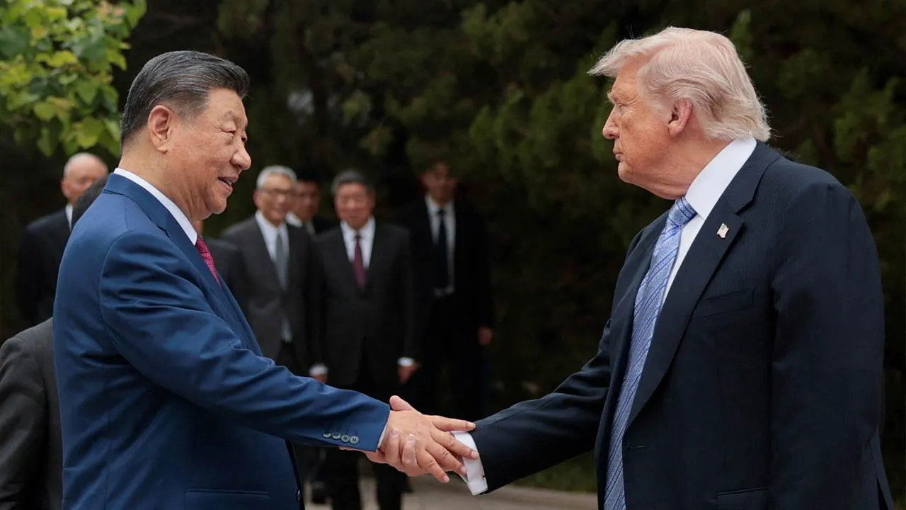 U.S. President Donald Trump shakes hands with Chinese President Xi Jinping while leaving after a visit to the Zhongnanhai Garden in Beijing, China, May 15, 2026. REUTERS/Evan Vucci/Pool