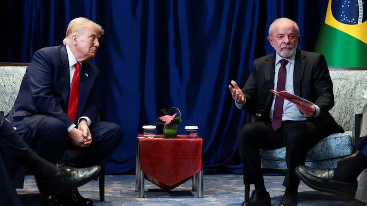 U.S. President Donald Trump listens to Brazilian President Luiz Inacio Lula da Silva speak as they meet on the sidelines of the 47th Association of Southeast Asian Nations (ASEAN) summit in Kuala Lumpur, Malaysia, October 26, 2025. REUTERS/Evelyn Hockstein