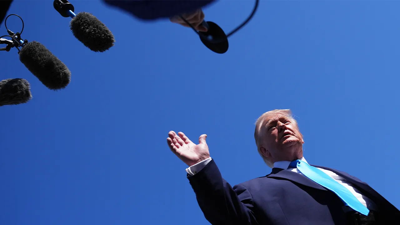President Donald Trump speaks to the press before boarding Air Force One, Wednesday, May 20, 2026, at Joint Base Andrews, Md., en route to speak at the U.S. Coast Guard Academy commencement. (AP Photo/Jacquelyn Martin)