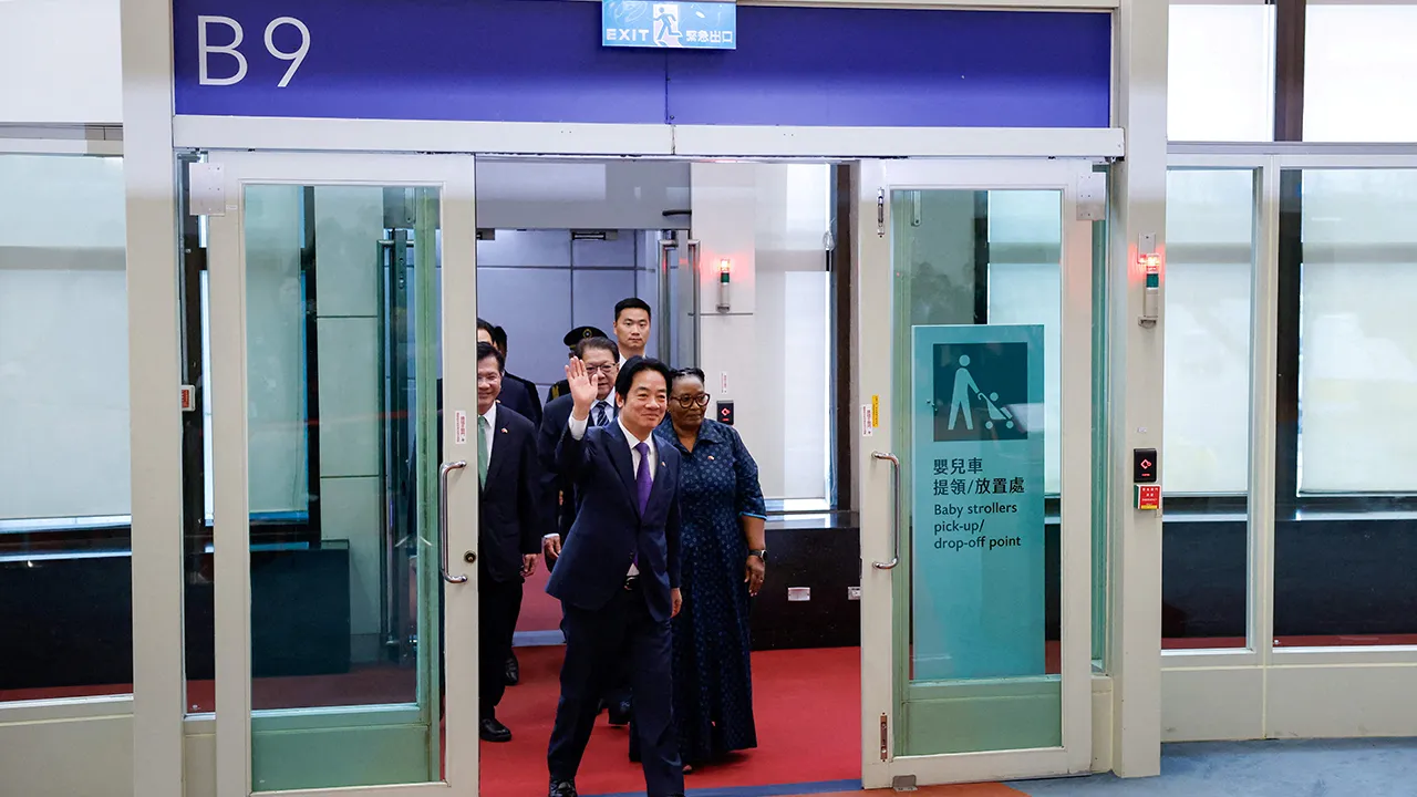 Taiwan President Lai Ching-te, accompanied by Deputy Prime Minister of the Kingdom of Eswatini Thulisile Dladla, arrives at a press conference upon returning from Eswatini, at Taoyuan International Airport, in Taoyuan, Taiwan, May 5, 2026. REUTERS/Ann Wang TPX IMAGES OF THE DAY