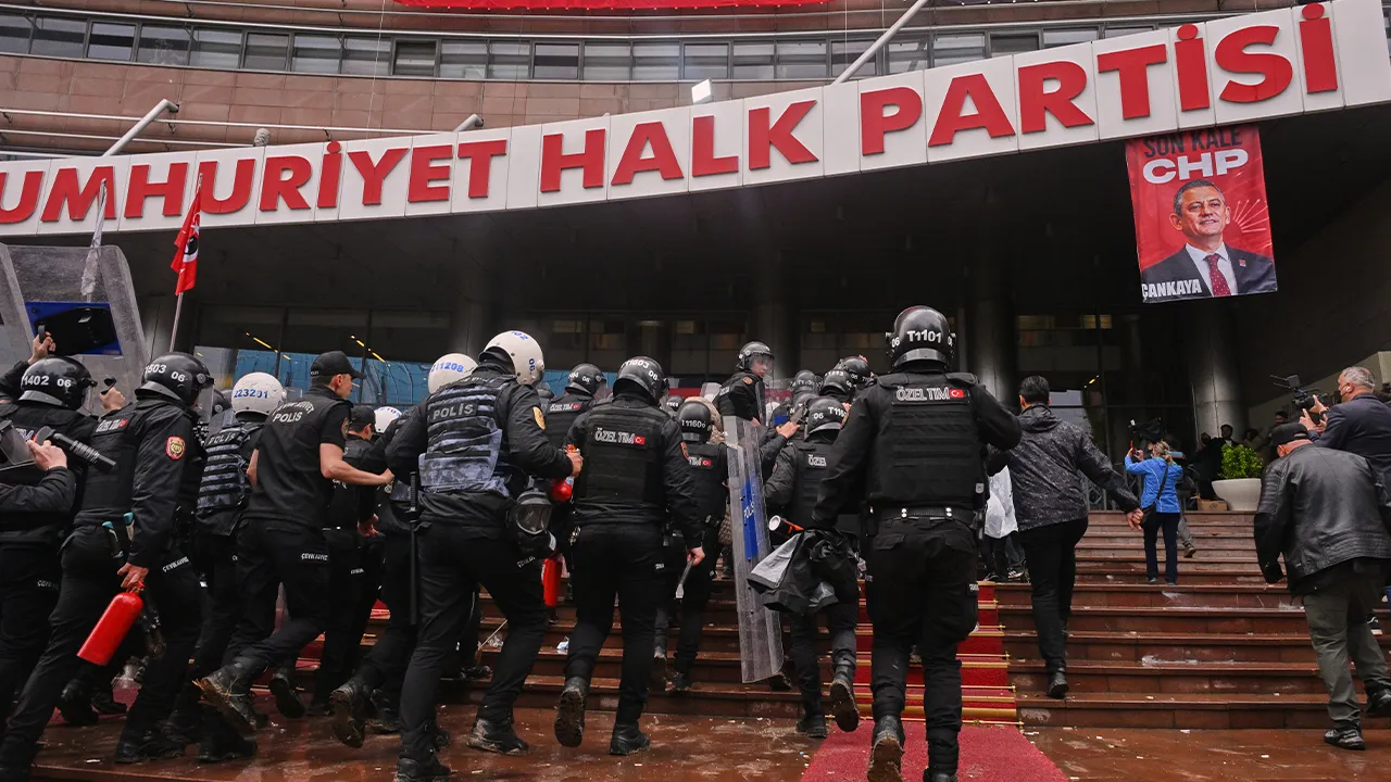 Police officers storm Turkey's main opposition Republican People's Party (CHP) headquarters to evict supporters gathered inside for party leader Ozgur Ozel, in Ankara, Sunday, May 24, 2026. (AP Photo/Ali Unal)