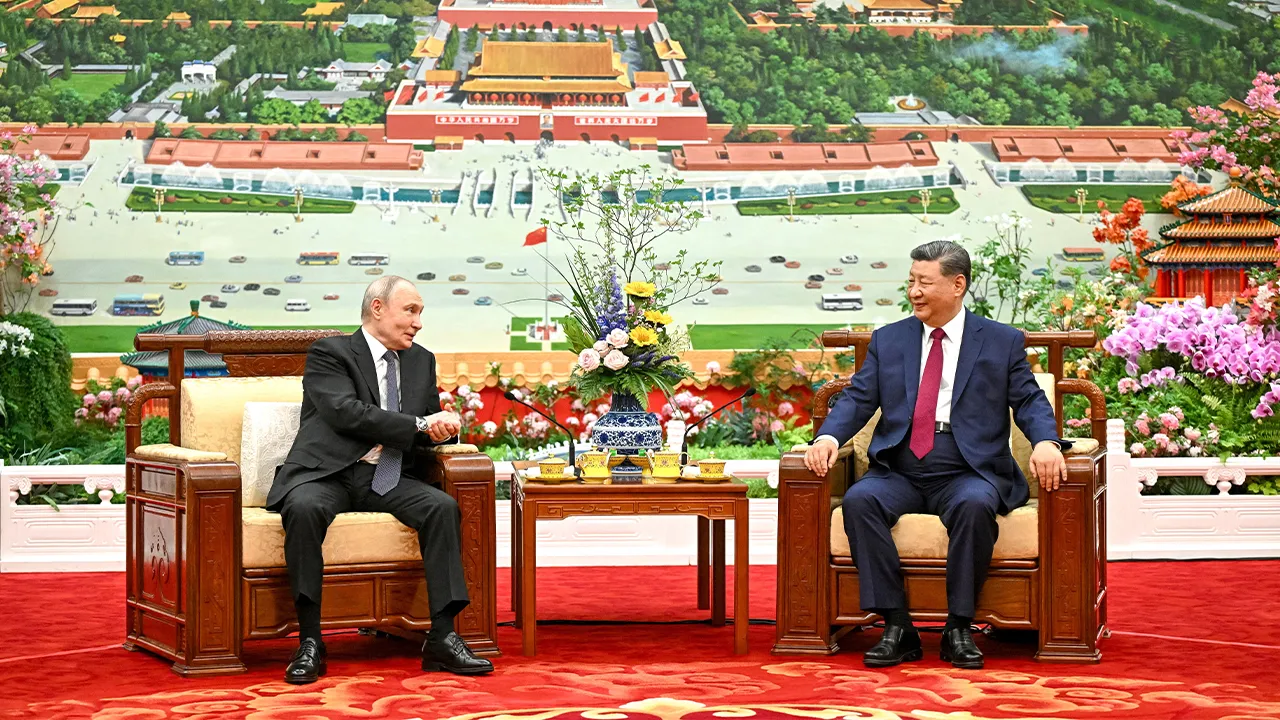 Russian President Vladimir Putin and Chinese President Xi Jinping have tea following their meeting at the Great Hall of the People in Beijing, China May 20, 2026. Sputnik/Kristina Solovyova/Pool via REUTERS ATTENTION EDITORS - THIS IMAGE WAS PROVIDED BY A THIRD PARTY.