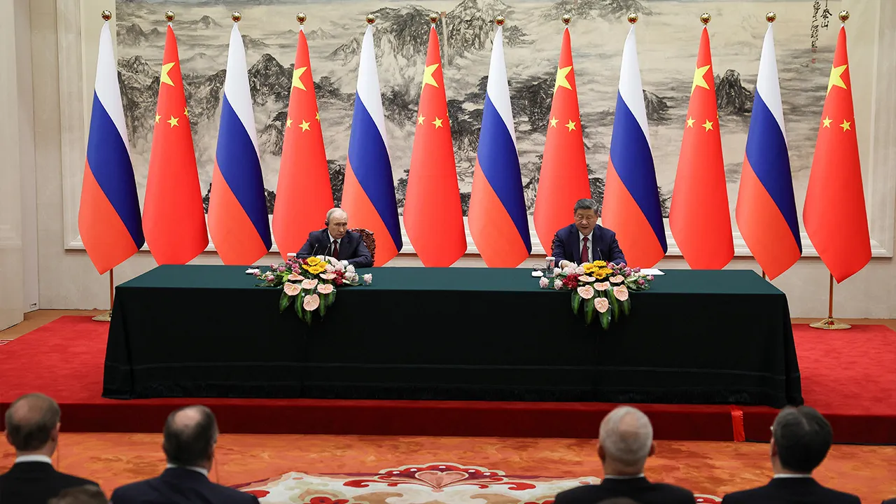 Russian President Vladimir Putin and Chinese President Xi Jinping deliver a joint press statement at the Great Hall of the People in Beijing, China May 20, 2026. REUTERS/Maxim Shemetov