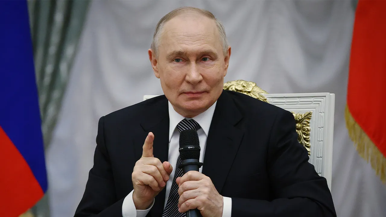 Russian President Vladimir Putin speaks to graduates from the Time of Heroes educational program for those who fought in Ukraine at the Kremlin in Moscow, Friday, May 22, 2026. (Sergei Bulkin, Sputnik, Kremlin Pool Photo via AP)