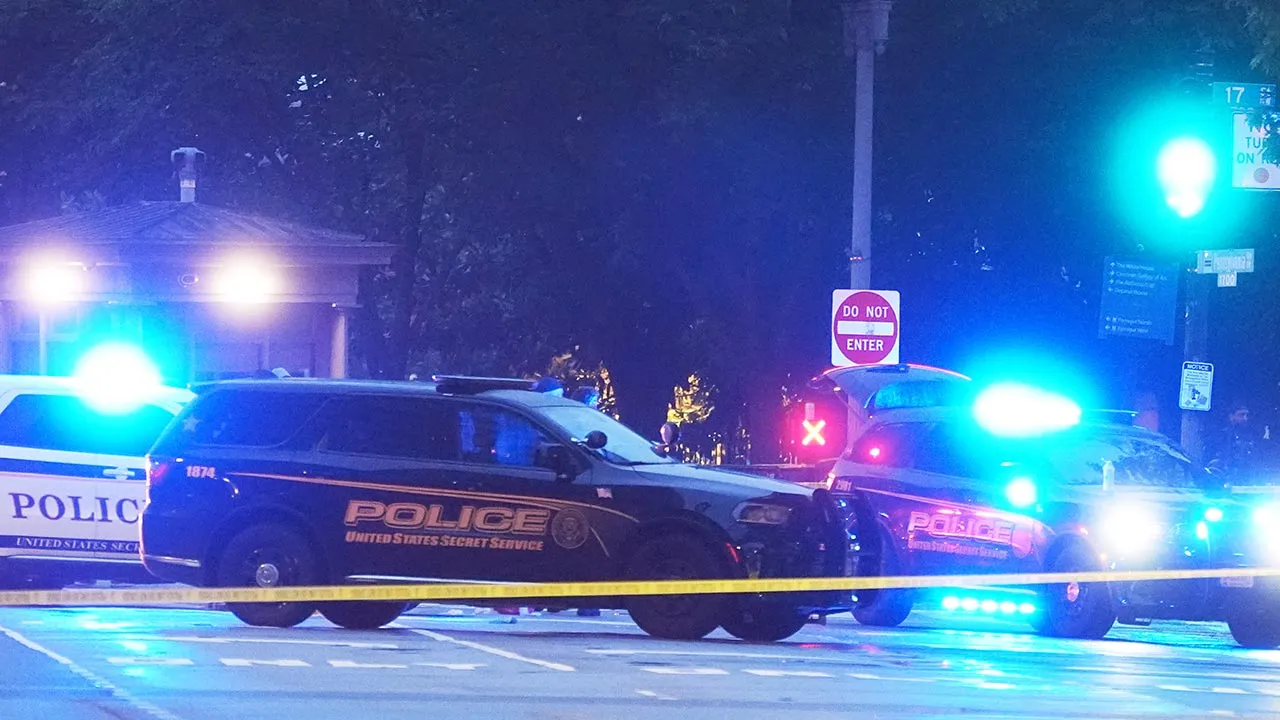 U.S. Secret Service Police are seen on a crime scene after responding to reports of shots fired near the White House, Saturday, May 23, 2026, in Washington. (AP Photo/Alex Brandon)