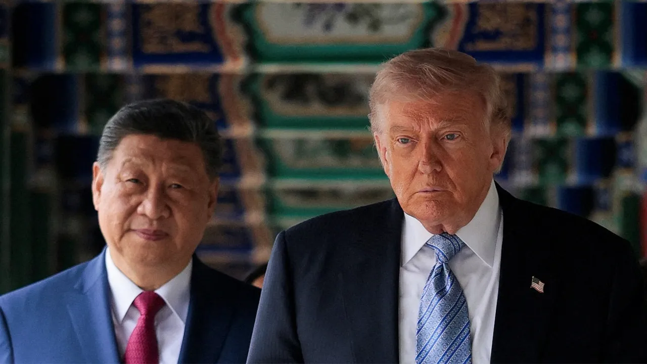U.S. President Donald Trump participates in a friendship walk through Zhongnanhai Garden with Chinese President Xi Jinping in Beijing, China, May 15, 2026. REUTERS/Evan Vucci/Pool