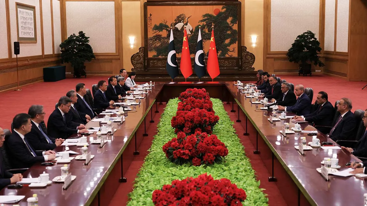 Chinese President Xi Jinping and Pakistan's Prime Minister Shehbaz Sharif attend a meeting at the Great Hall of the People, in Beijing, China May 25, 2026. REUTERS/Tingshu Wang/Pool