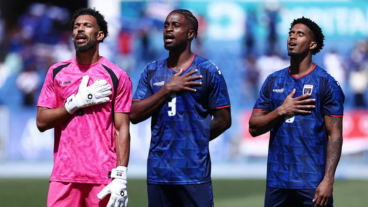 Soccer Football - International Friendly - Cape Verde v Serbia - Estadio do Restelo, Lisbon, Portugal - May 31, 2026 Cape Verde's Vozinha, Diney and Kevin Pina line up during the national anthems before the match REUTERS/Rodrigo Antunes