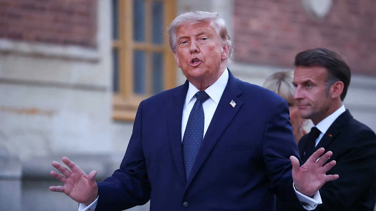 U.S. President Donald Trump speaks as he arrives to attend a dinner hosted by French President Emmanuel Macron and his wife, Brigitte Macron, to mark the 250th anniversary of the United States’ independence, at the Palace of Versailles near Paris, France, June 17, 2026. REUTERS/Gonzalo Fuentes