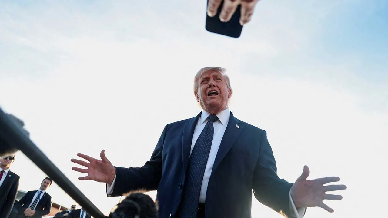 U.S. President Donald Trump speaks to the media upon arrival at Paris Orly airport, following the G7 Summit, in Orly, France, June 17, 2026. REUTERS/Evelyn Hockstein