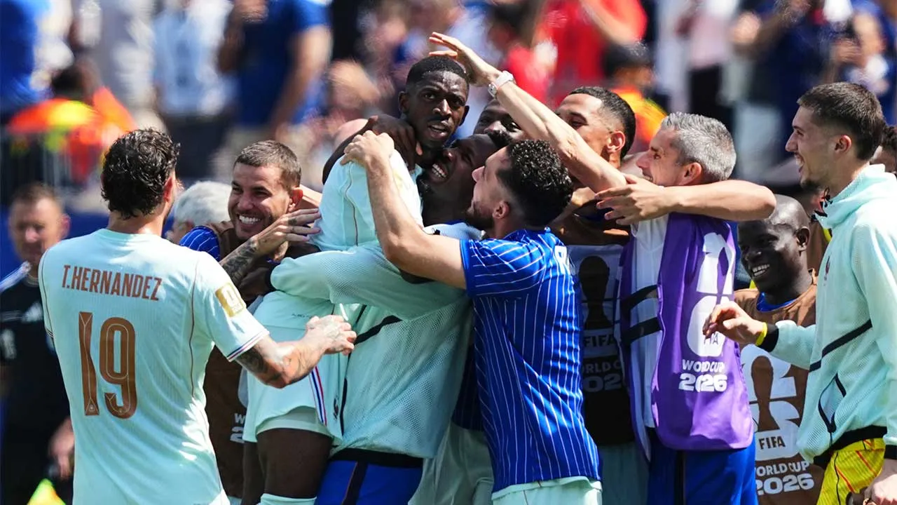France's Ousmane Dembele, center, celebrates after scoring his side's second goal during the World Cup Group I soccer match between Norway and France in Foxborough, Mass., near Boston, Friday, June 26, 2026. (AP Photo/Martin Meissner)