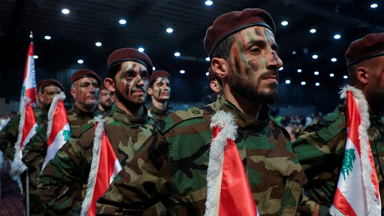 FILE PHOTO: Hezbollah members parade during a rally marking al-Quds Day, (Jerusalem Day) in Beirut's southern suburbs, Lebanon April 5, 2024. REUTERS/Mohamed Azakir/File Photo