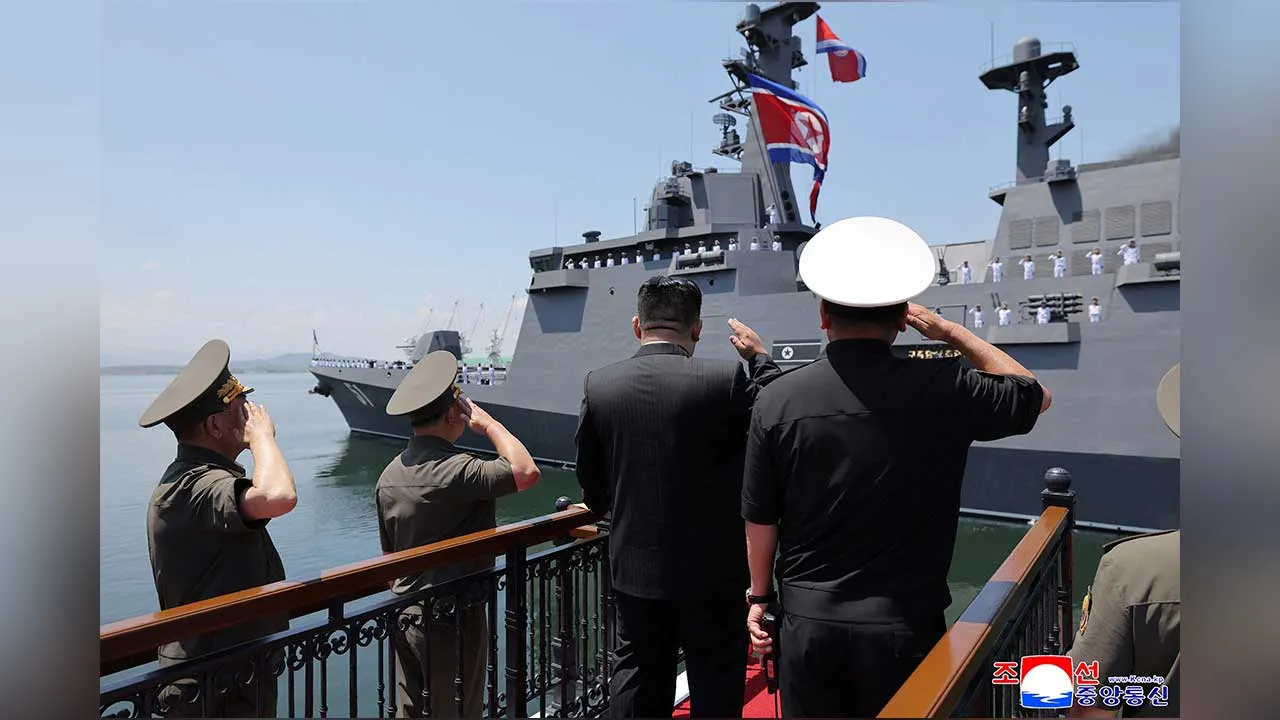 North Korean leader Kim Jong Un salutes during the commissioning ceremony of the new multipurpose destroyer Choe Hyon at Nampho port, North Korea, June 23, 2026, in this picture released by North Korea's official Korean Central News Agency. KCNA via REUTERS ATTENTION EDITORS - THIS IMAGE WAS PROVIDED BY A THIRD PARTY. REUTERS IS UNABLE TO INDEPENDENTLY VERIFY THIS IMAGE. NO THIRD PARTY SALES. SOUTH KOREA OUT. NO COMMERCIAL OR EDITORIAL SALES IN SOUTH KOREA. TPX IMAGES OF THE DAY