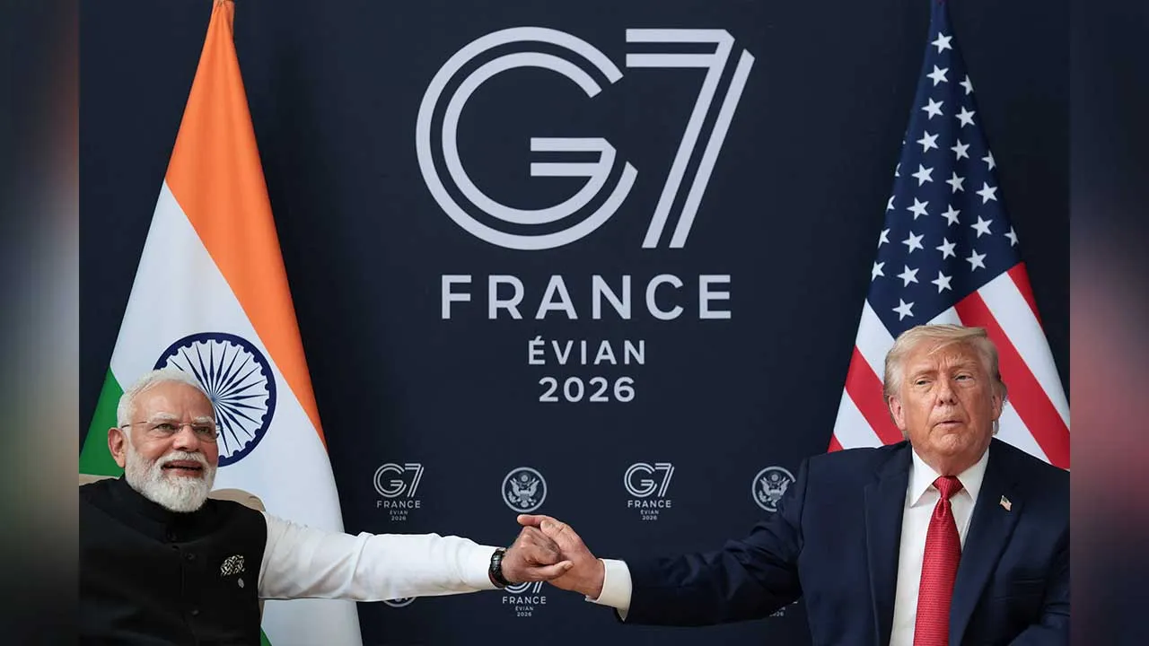 U.S. President Donald Trump holds Indian Prime Minister Narendra Modi's hand as they attend a bilateral meeting during the G7 Summit in Evian-les-Bains, France, June 17, 2026. REUTERS/Evelyn Hockstein