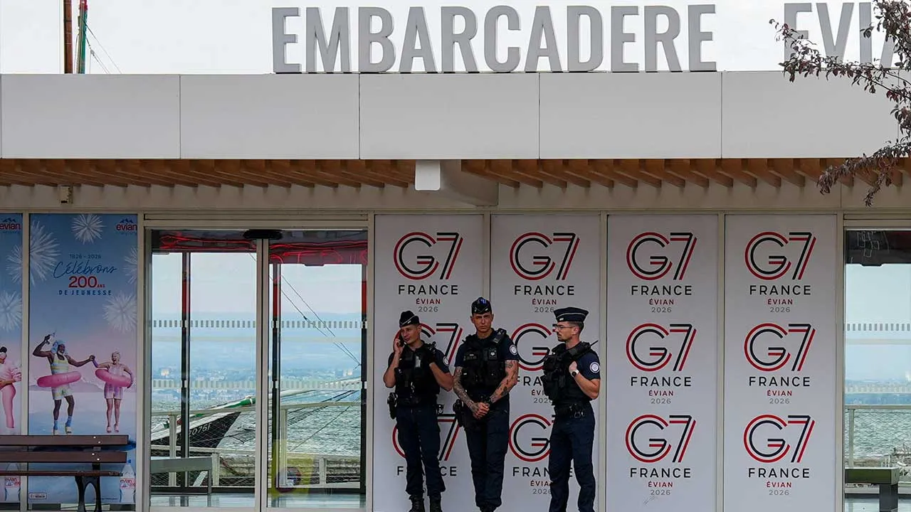 Police officers stand at the pier near Lake Leman ahead of the G7 summit in Evian-les-Bains, France, June 10, 2026. REUTERS/Cecile Mantovani