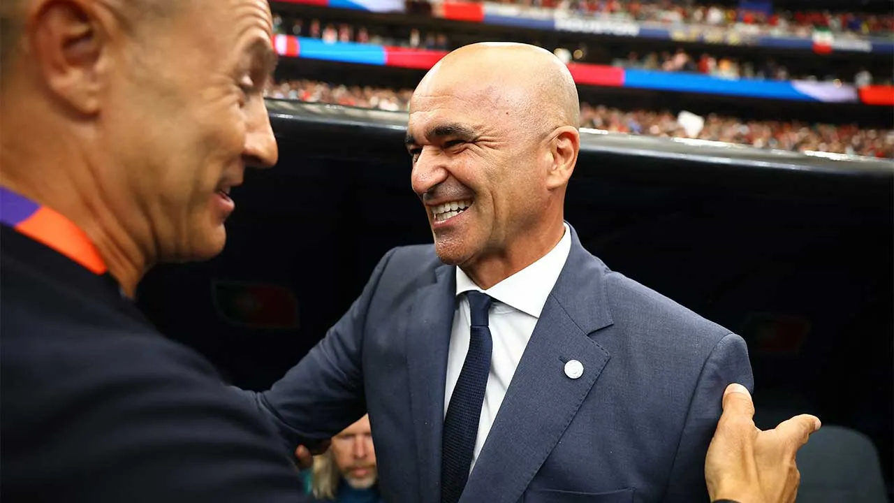 Soccer Football - FIFA World Cup 2026 - Group K - Portugal v Uzbekistan - Houston Stadium, Houston, Texas, U.S. - June 23, 2026 Portugal coach Roberto Martinez shakes hands with Uzbekistan coach Fabio Cannavaro before the match REUTERS/Pedro Nunes