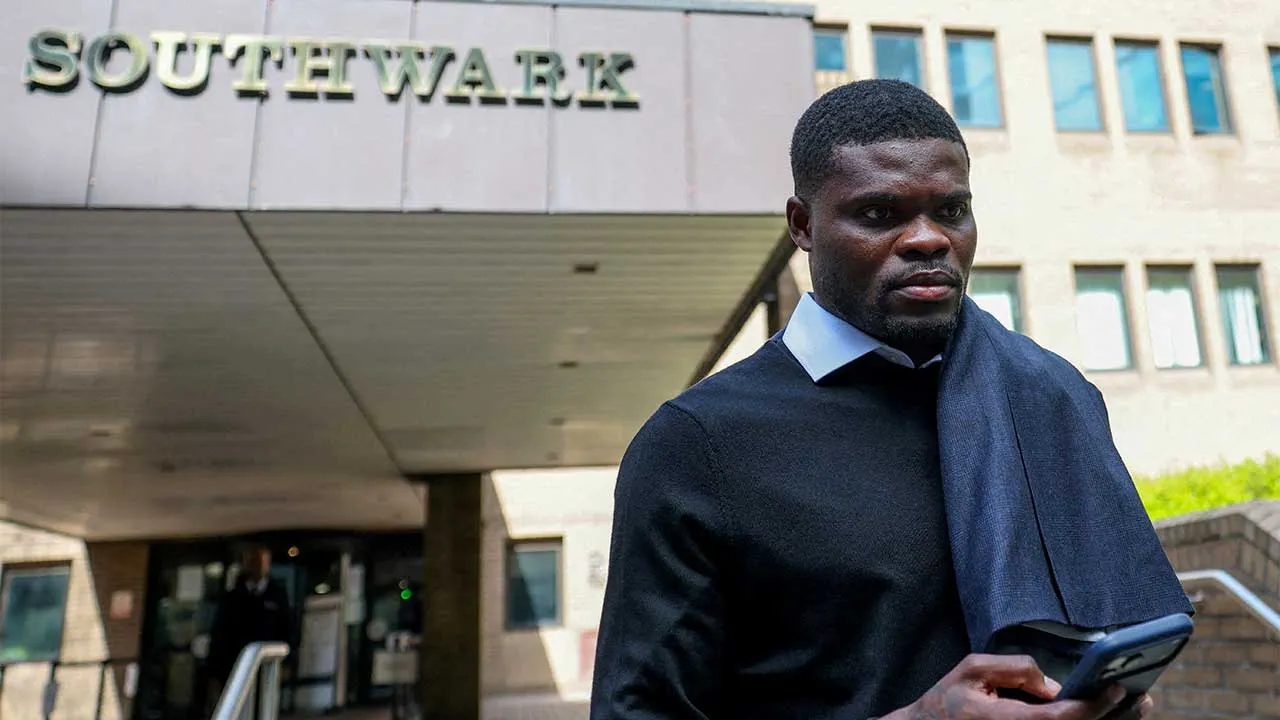 FILE PHOTO: Ghana national team and Villarreal midfielder Thomas Partey, who is facing two additional counts of rape and has pleaded not guilty to five counts of rape and one count of sexual assault, leaves the Southwark Crown Court in London, Britain, April 13, 2026. REUTERS/Hannah McKay TPX IMAGES OF THE DAY/File Photo
