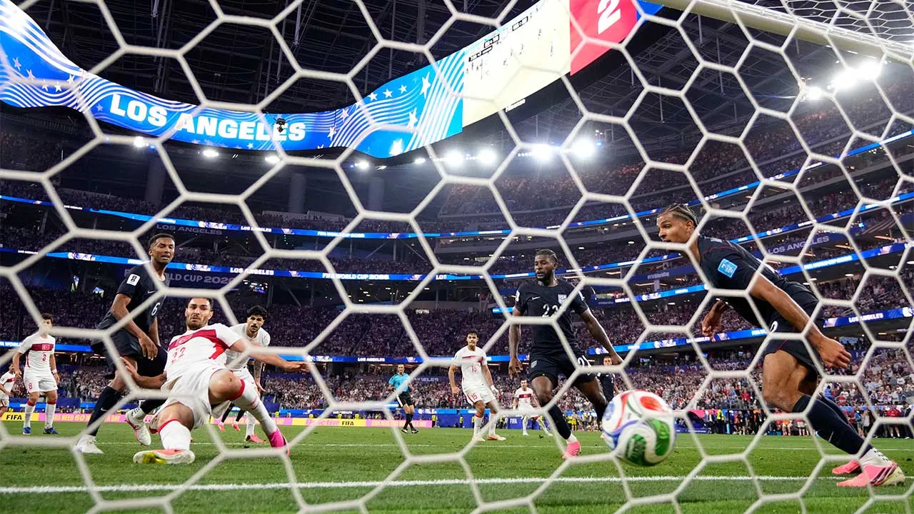 Turkey's Kaan Ayhan (22) scores their third goal during the World Cup Group D soccer match between Turkey and the United States in Inglewood, Calif., near Los Angeles, Thursday, June 25, 2026. (AP Photo/Mark J. Terrill)