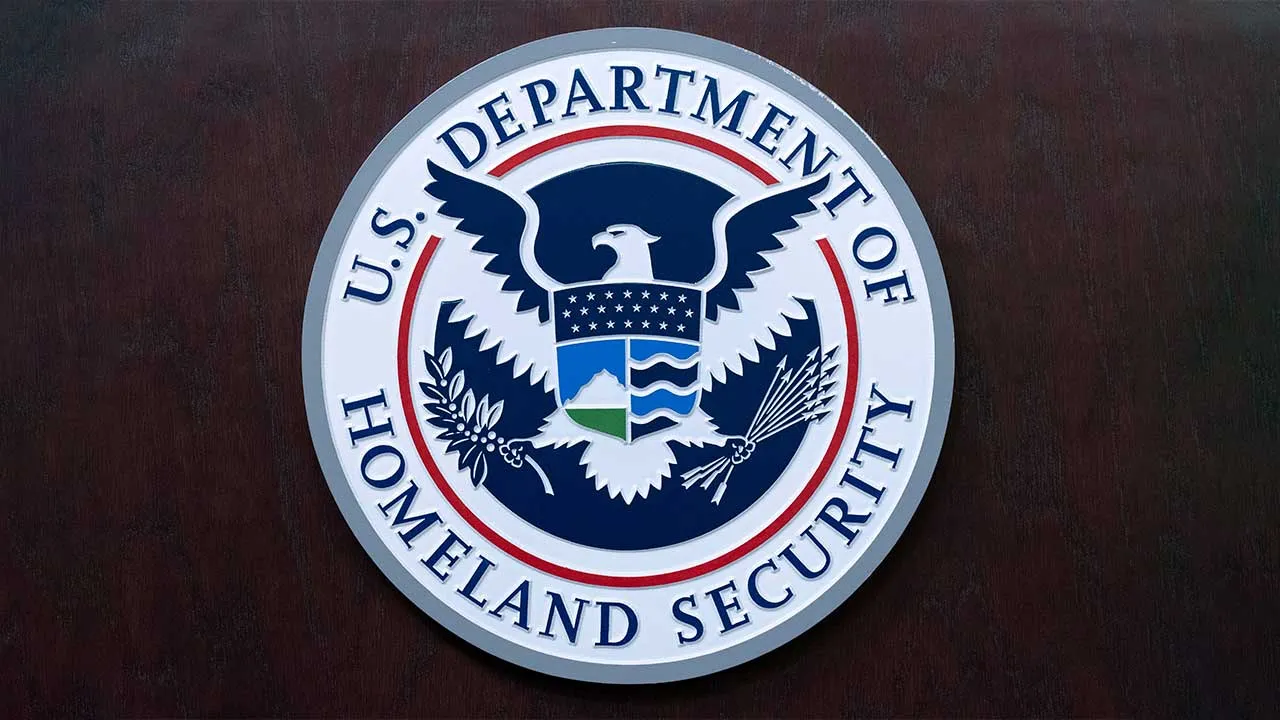 FILE - The seal of U.S. Department of Homeland Security is seen before a news conference at ICE Headquarters in Washington, May 21, 2025. (AP Photo/Jose Luis Magana, File)