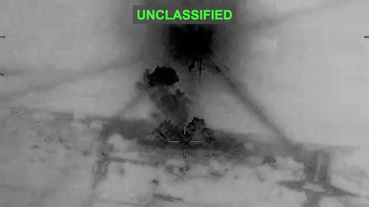 Smoke rises from explosions at an unknown location, following what U.S. Central Command (CENTCOM) said were strikes on Iran in response to an Iranian drone strike on a cargo ship in the Strait of Hormuz, in this screen grab from video released June 26, 2026. U.S. Central Command/Handout via REUTERS THIS IMAGE HAS BEEN SUPPLIED BY A THIRD PARTY. MANDATORY CREDIT. OVERLAY FROM SOURCE. VERIFICATION - Location and date could not be verified. - No earlier version of the video found posted online before Friday (J