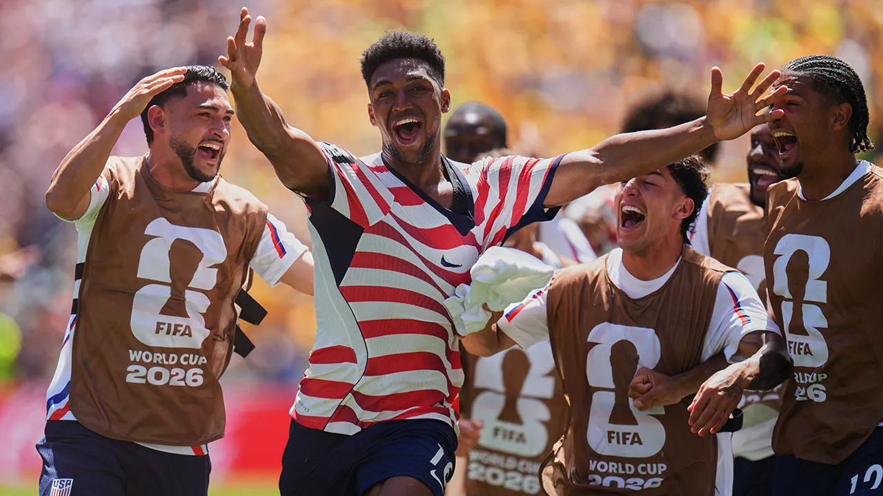 United States' Alex Freeman (16), second left, celebrates after scoring his side's second goal during the World Cup Group D soccer match between the United States and Australia in Seattle, Friday, June 19, 2026. (AP Photo/Manu Fernandez)
