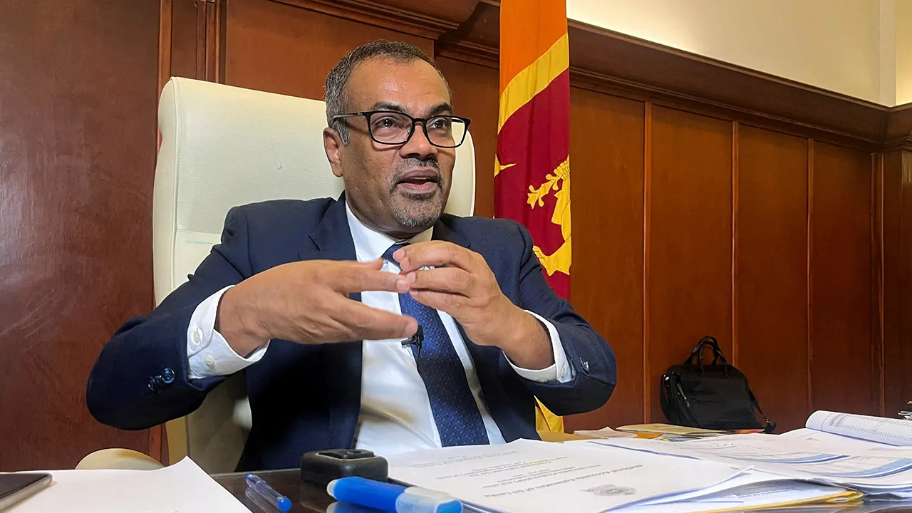 Sri Lanka's Deputy Finance Minister Anil Jayantha Fernando speaks during an interview in Colombo, Sri Lanka December 17, 2025. REUTERS/Channa Kumara/File Photo