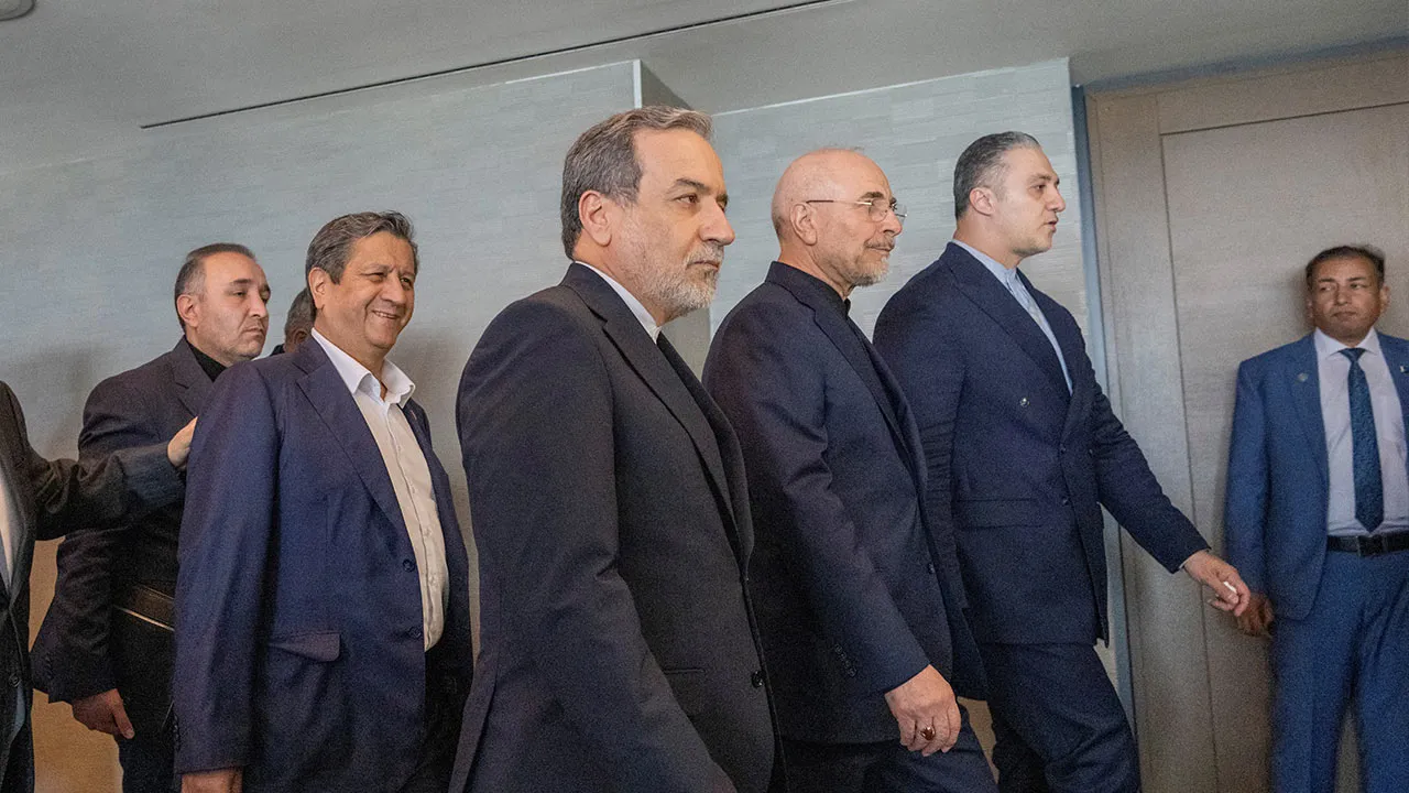 Minister of Foreign Affairs of Iran Abbas Araqchi, and Speaker of Iran Mohammed Bagher Ghalibaf with the delegation of Iran at the Lake Lucerne Summit at the Buergenstock resort in Obbuergen, near Lucerne, Switzerland, Sunday, June 21, 2026. URS FLUEELER/Pool via REUTERS URS FLUEELER/Pool via REUTERS