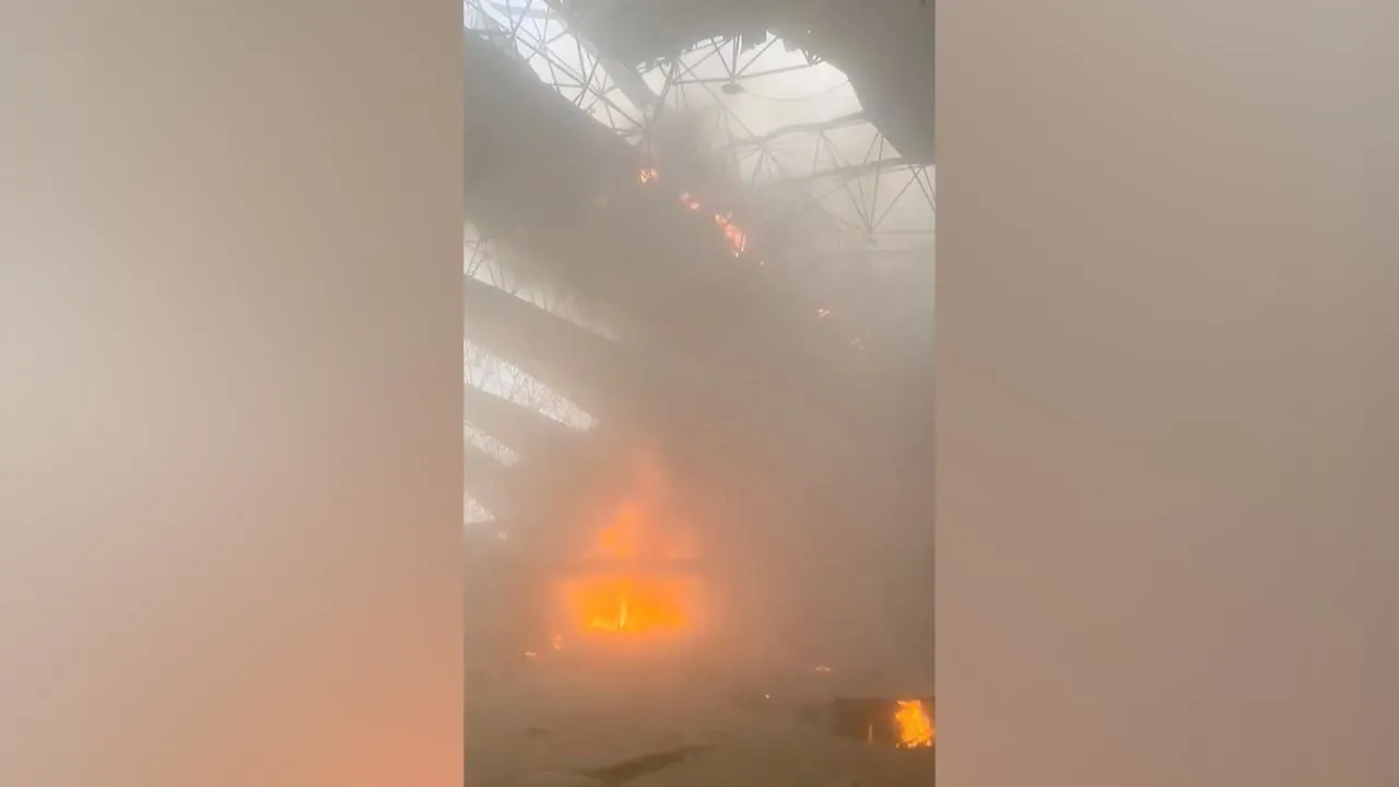 Flames and smoke rise from a fire, in the aftermath of Iranian strikes, according to the foreign ministry, at Kuwait International Airport in Kuwait City, Kuwait, June 3, 2026, in this still image obtained from a social media video. Social Media/via REUTERS