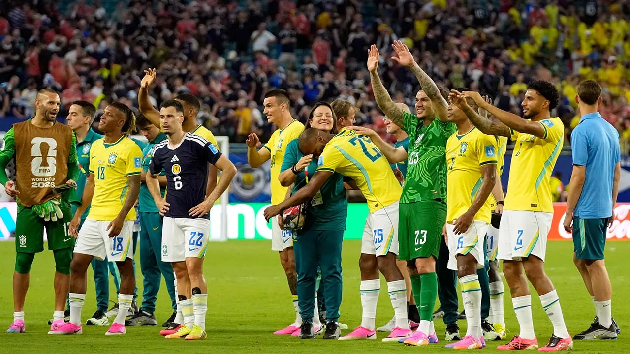 Brazil players celebrate after the World Cup Group C soccer match between Scotland and Brazil in Miami Gardens, Fla., Wednesday, June 24, 2026. (AP Photo/Lynne Sladky)