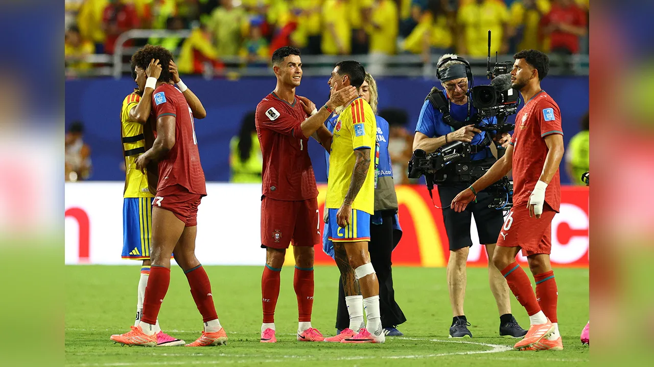 Soccer Football - FIFA World Cup 2026 - Group K - Colombia v Portugal - Miami Stadium, Miami Gardens, Florida, U.S. - June 27, 2026 Portugal's Cristiano Ronaldo and Colombia's Daniel Munoz embrace after the match IMAGN IMAGES via Reuters/Nathan Ray Seebeck