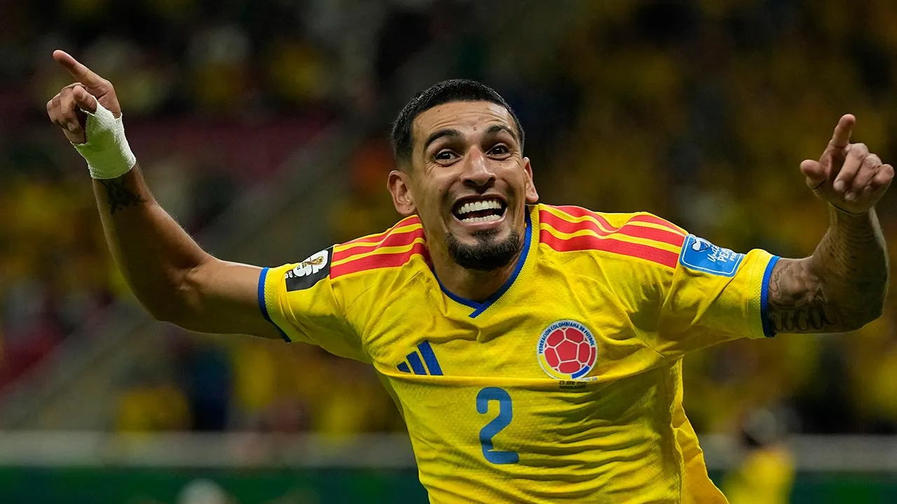 Colombia's Daniel Munoz celebrates after scoring his side's opening goal during the World Cup Group K soccer match between Colombia and Congo in Zapopan, near Guadalajara, Mexico, Tuesday, June 23, 2026. (AP Photo/Ricardo Mazalan)