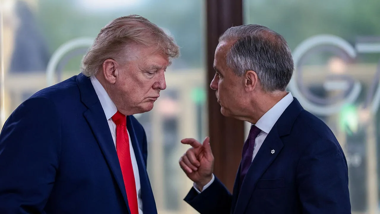 U.S. President Donald Trump speaks with Canadian Prime Minister Mark Carney at a working lunch with leaders of G7 and the Middle East, in Evian-les-Bains, France, June 16, 2026. REUTERS/Evelyn Hockstein/Pool