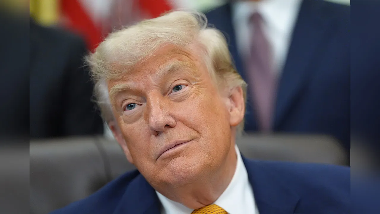 President Donald Trump is pictured in the Oval Office of the White House during an executive order signing about quantum computing, Monday, June 22, 2026, in Washington. (AP Photo/Jacquelyn Martin)
