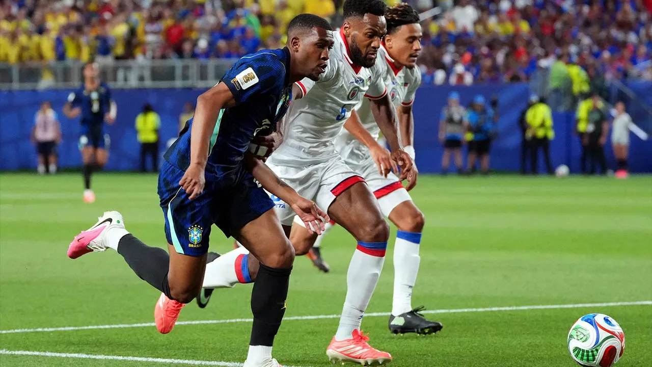 Soccer Football - FIFA World Cup 2026 - Group C - Brazil v Haiti - Philadelphia Stadium, Philadelphia, Pennsylvania, U.S. - June 19, 2026 Brazil's Rayan in action with Haiti's Hannes Delcroix IMAGN IMAGES via Reuters/James Lang
