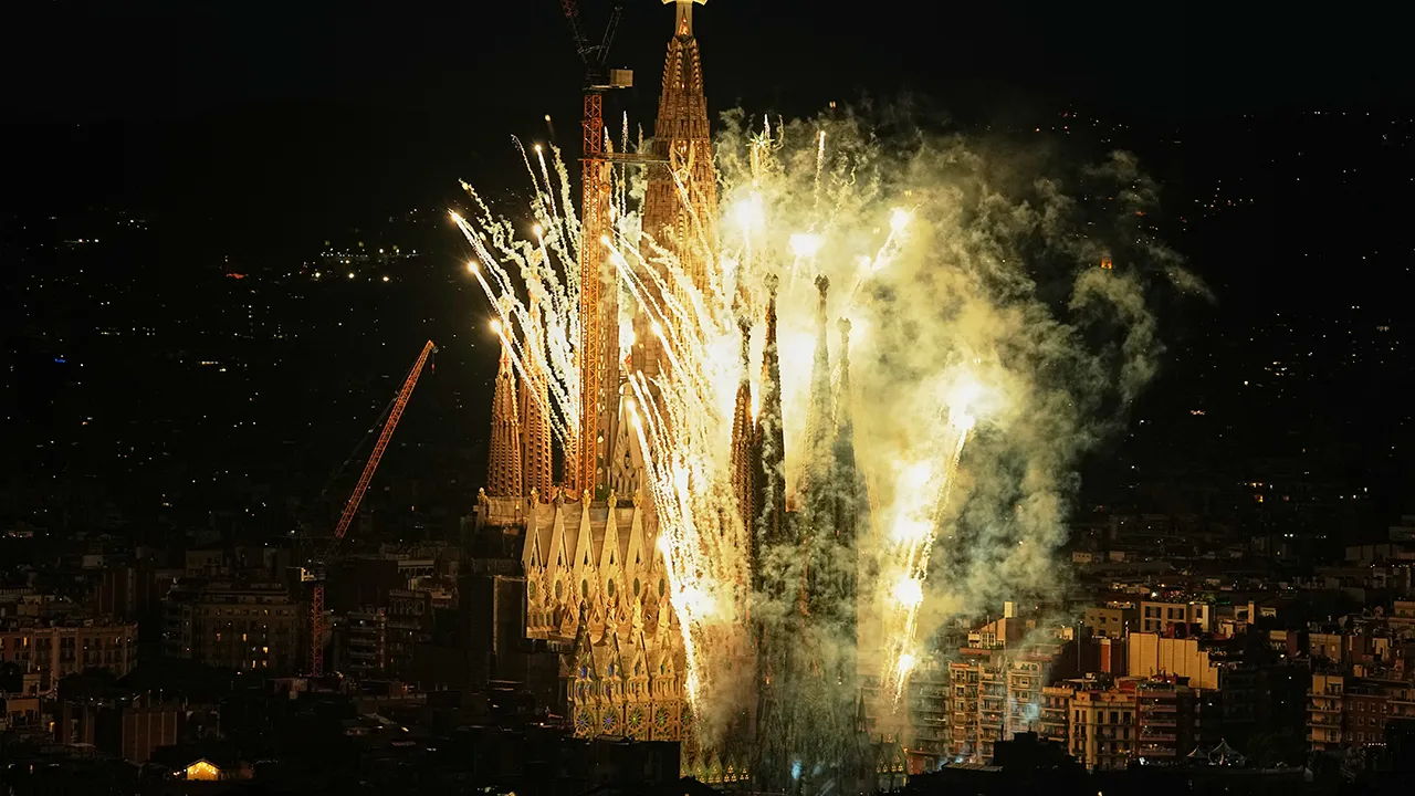 Fireworks engulf Antoni Gaudí's Basilica of the Sagrada Família, seen from Torre Glòries, after Pope Leo XIV blessed the newly completed central Tower of Jesus Christ in Barcelona, Spain, Wednesday, June 10, 2026. The tower's completion made the Sagrada Família, at 172.5 meters (566 feet), the tallest church in the world. (AP Photo/Fatima Shbair)