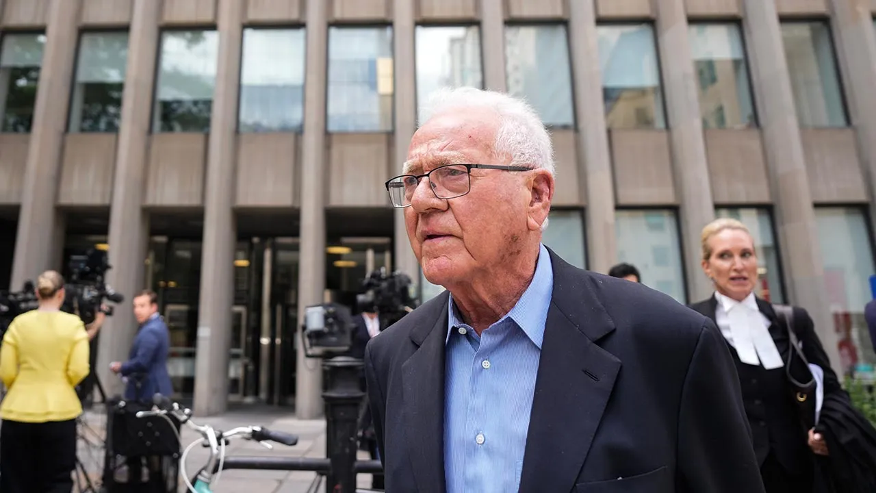 Frank Stronach leaves a Toronto court on Friday, June 19, 2026. (Chris Young /The Canadian Press via AP)