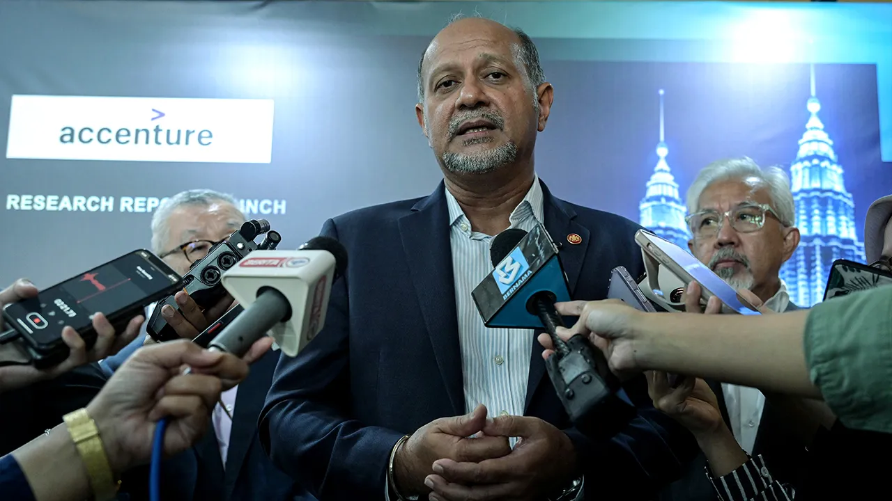 KUALA LUMPUR, June 22 -- Digital Minister Gobind Singh Deo speaks at a press conference after officiating the FIDE Forum and launching Accenture Malaysia's new report on AI adoption in Malaysia's financial sector at the Asia School of Business today.  -- fotoBERNAMA (2026) COPYRIGHT RESERVED