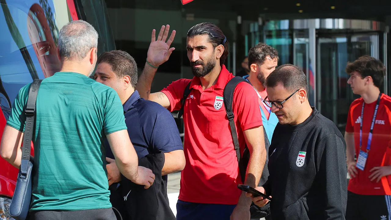 Iran national team goalkeeper Alireza Beiranvand gestures to fans as he leaves the team hotel for a training session at Caliente Stadium ahead of the 2026 FIFA World Cup, in Tijuana, Mexico, June 9, 2026. REUTERS/Jorge Duenes
