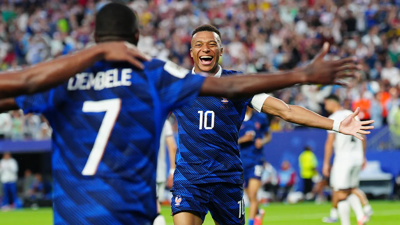 France's Ousmane Dembele (7) celebrates with Kylian Mbappe (10) after scoring their third goal during the World Cup Group I soccer match between France and Iraq in Philadelphia, Monday, June 22, 2026. (AP Photo/Derik Hamilton)