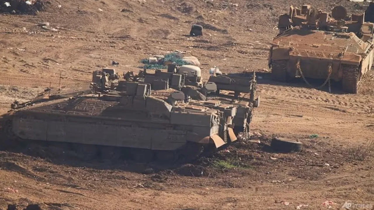 Israeli military APCs parked in northern Israel, near the border with Lebanon, Jun 27, 2026 after Israel and Lebanon sign a framework agreement, described as a first step toward peace following months of conflict between Israel and the Lebanese militant group Hezbollah. (Photo: AP/Ariel Schalit)