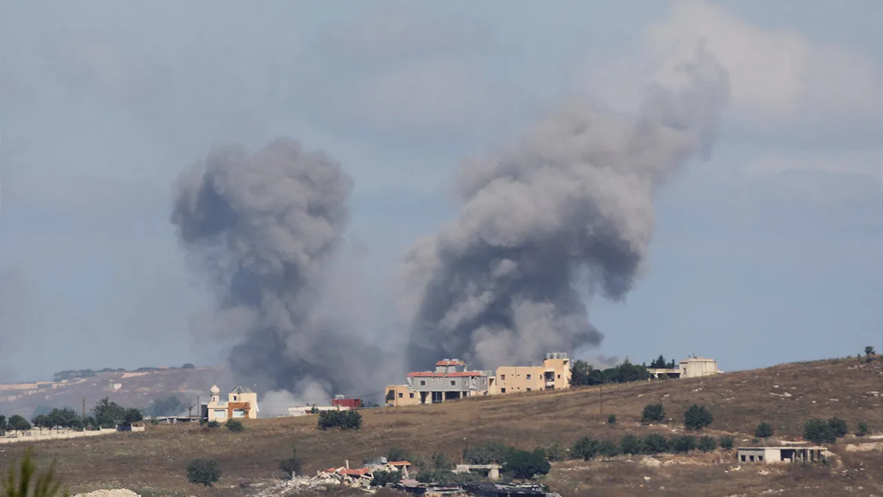 Smoke billows from southern Lebanon following an Israeli strike, as seen from Marjayoun, Lebanon, June 19, 2026. REUTERS/Stringer