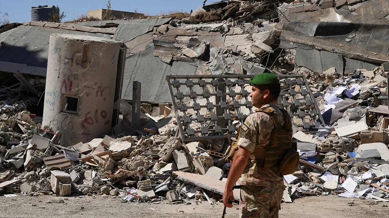 A Lebanese army soldier inspects the damage in the aftermath of an Israeli strike in Nabatieh, Lebanon June 21, 2026. REUTERS/Stringer