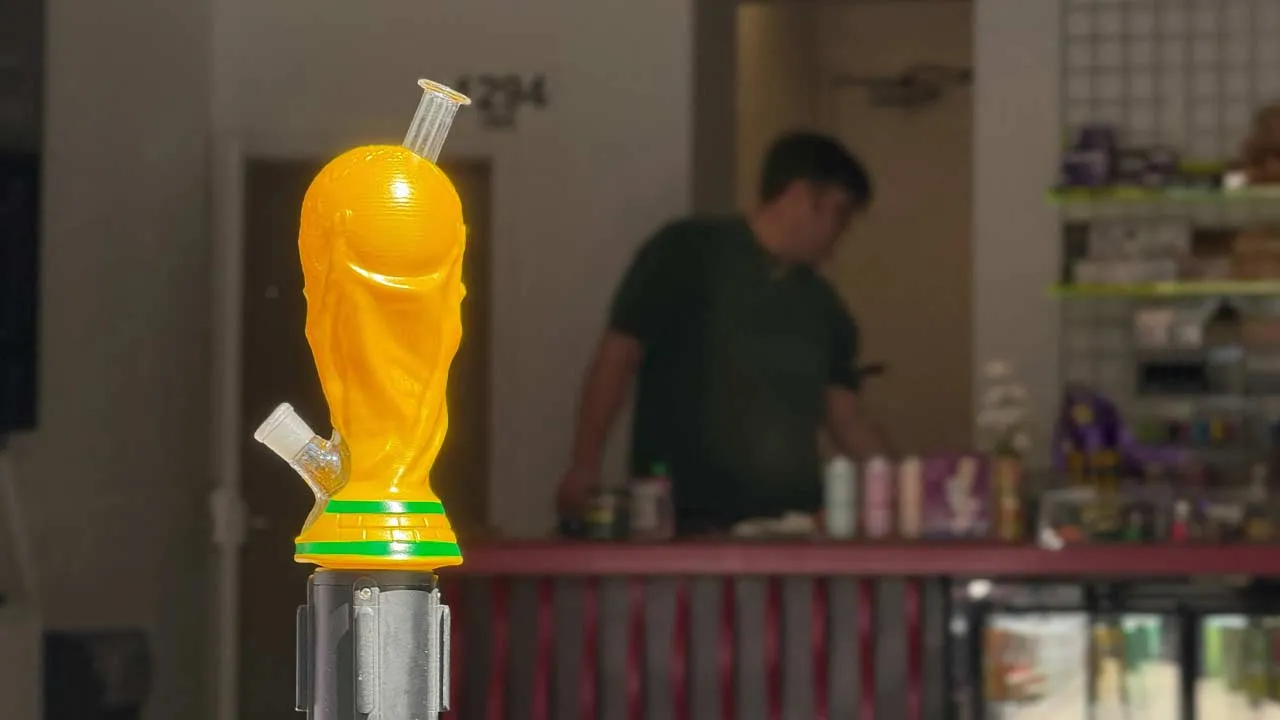 The 'FIFA BONG', which resembles the FIFA World Cup trophy, during the FIFA World Cup 2026, as Sean Kady, 38 owner of Cosmos Charlies, stands in his shop, in Toronto, Ontario, Canada, June 15, 2026. Picture taken with a mobile phone. REUTERS/Divya Rajagopal